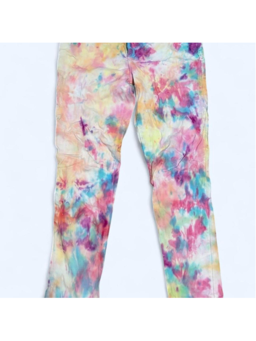 Multi-colored tie-dye Ann Taylor Loft skinny jeans with pink, blue, and yellow s